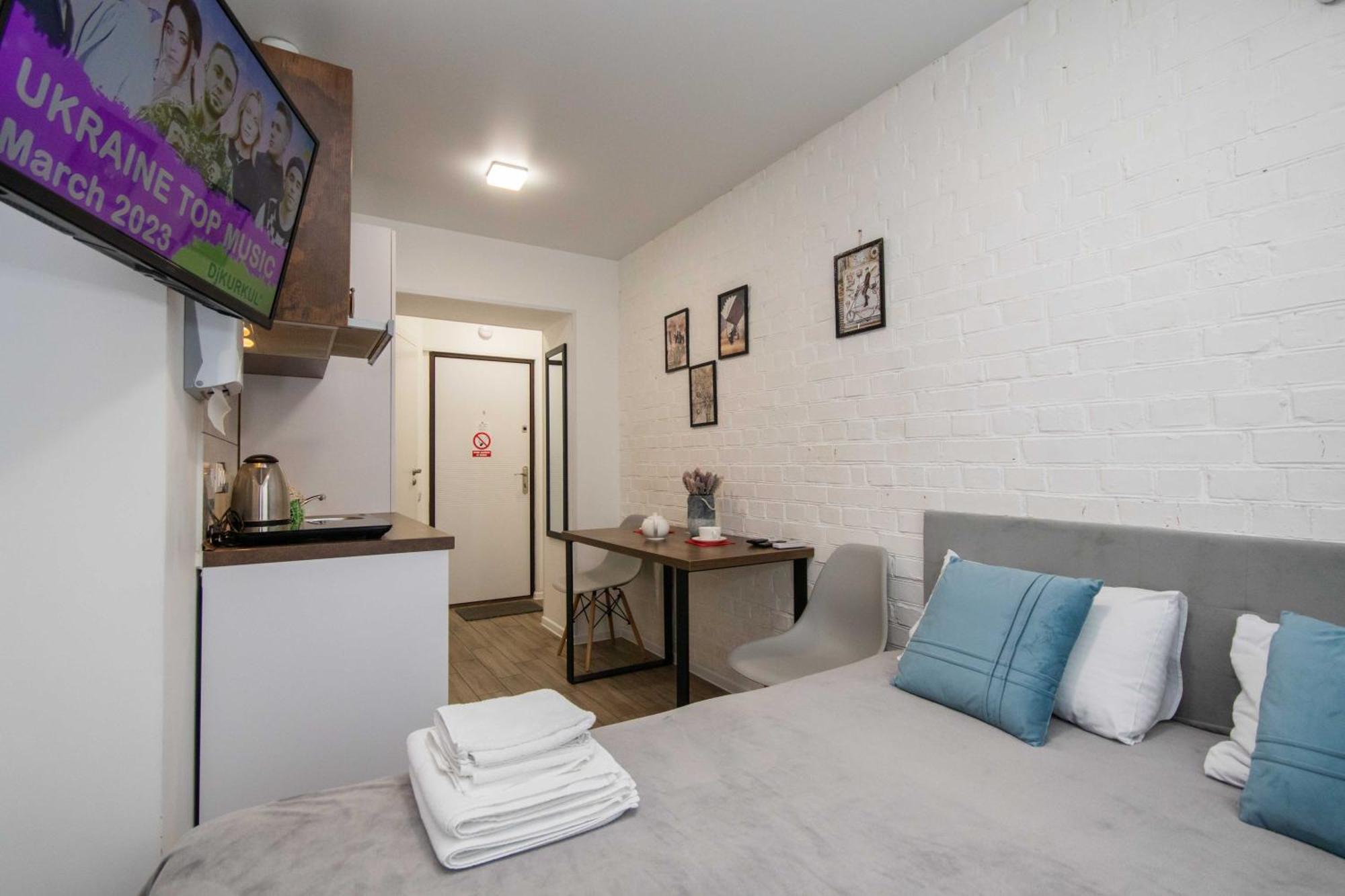 Стильні апартаменти-студіо на Подолі поруч з метро  Modern Apartments on Podol near metro station  Kyiv MF Номер фото