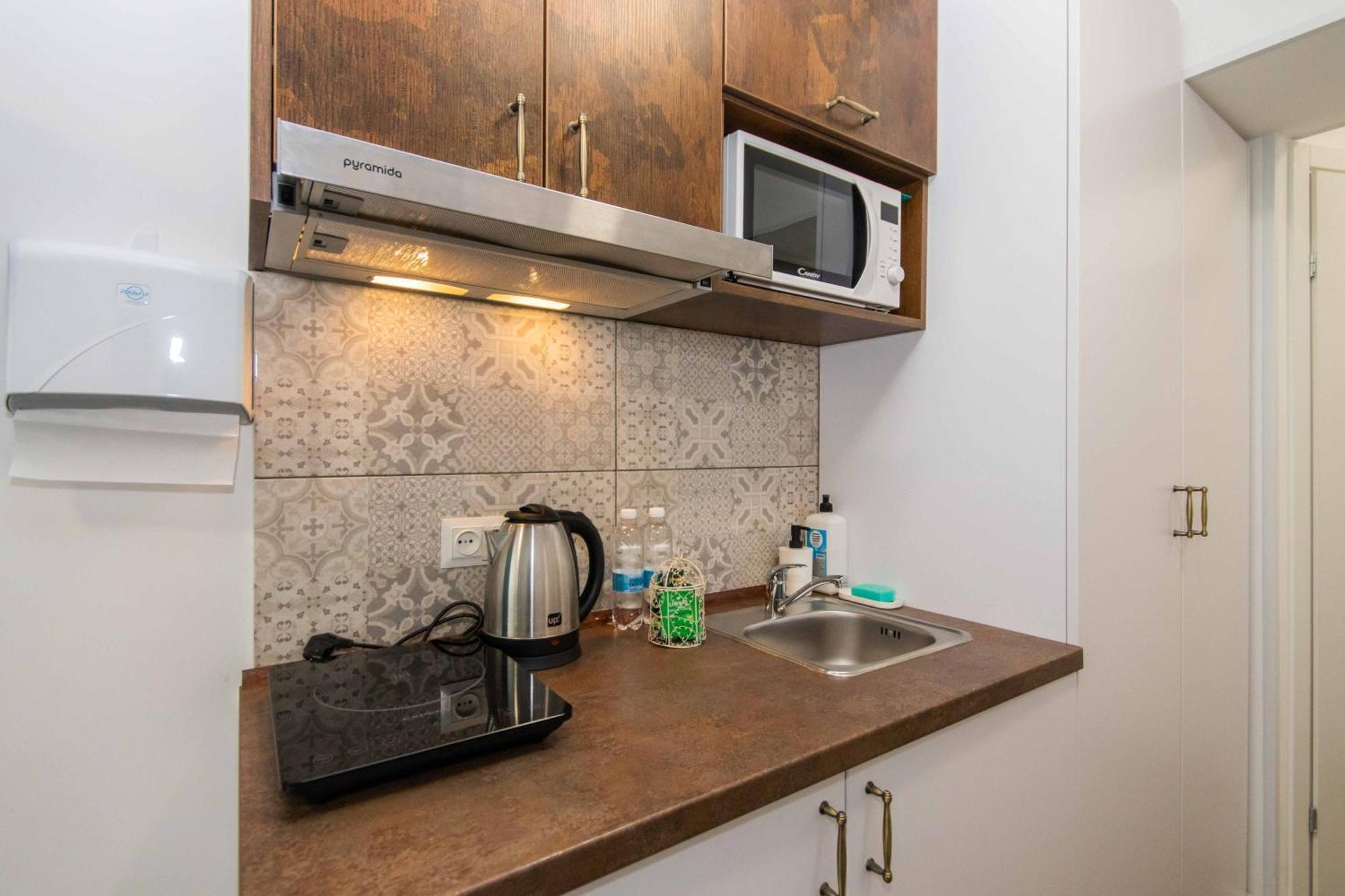 Стильні апартаменти-студіо на Подолі поруч з метро  Modern Apartments on Podol near metro station  Kyiv MF Номер фото
